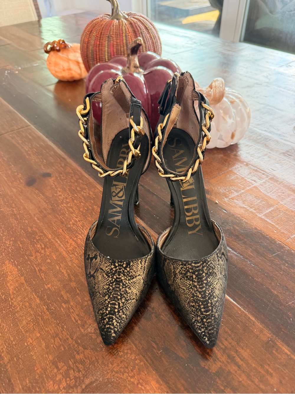 Sam & Libby Black Snake-Print Pointed Heels with Gold Chain Ankle Detail